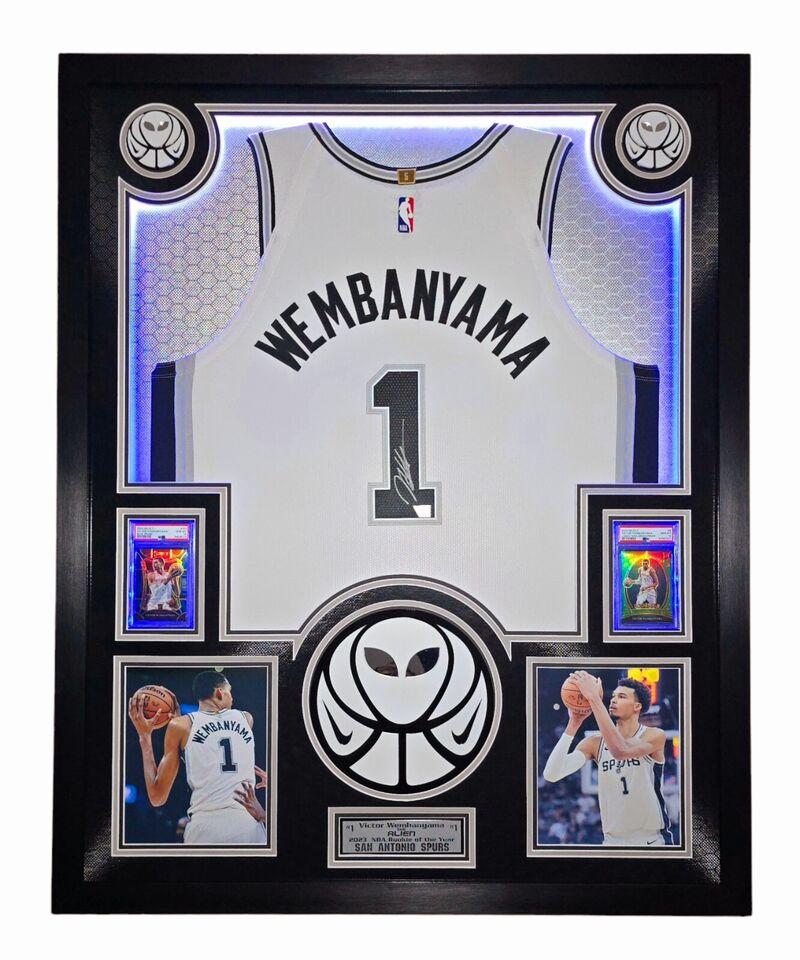 Victor Wembanyama Signed Spurs Custom Framed Nike Vaporknit Jersey with LED Display & (2) PSA 10 Graded Rookie Cards (Fanatics) at PristineAuction.com Victor Wembanyama Signed Spurs Custom Framed Nike Vaporknit Jersey with LED Display & (2) PSA 10 Graded Rookie Cards (Fanatics) at PristineAuction.com