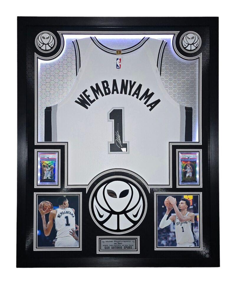 Victor Wembanyama Signed Spurs Custom Framed Nike Vaporknit Jersey with LED Display & (2) PSA 10 Graded Rookie Cards (Fanatics) at PristineAuction.com Victor Wembanyama Signed Spurs Custom Framed Nike Vaporknit Jersey with LED Display & (2) PSA 10 Graded Rookie Cards (Fanatics) at PristineAuction.com