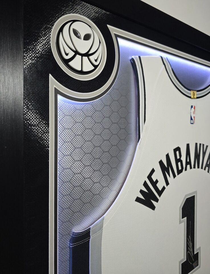 Victor Wembanyama Signed Spurs Custom Framed Nike Vaporknit Jersey with LED Display & (2) PSA 10 Graded Rookie Cards (Fanatics) at PristineAuction.com Victor Wembanyama Signed Spurs Custom Framed Nike Vaporknit Jersey with LED Display & (2) PSA 10 Graded Rookie Cards (Fanatics) at PristineAuction.com