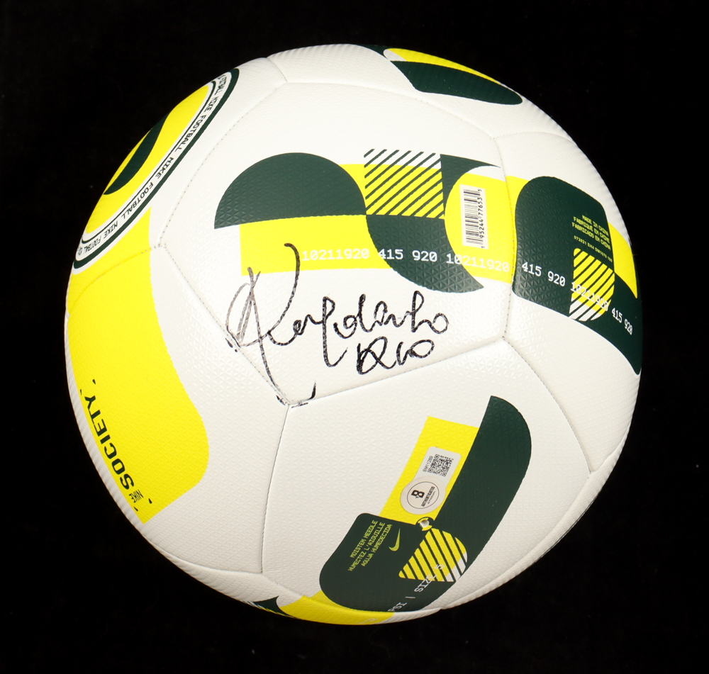 Ronaldinho Signed 2022 Nike Brazil Soccer Ball Inscribed "Rio" (Beckett) at PristineAuction.com Ronaldinho Signed 2022 Nike Brazil Soccer Ball Inscribed "Rio" (Beckett) at PristineAuction.com