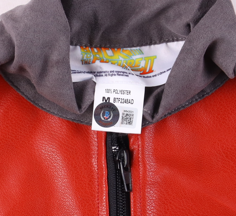 "Back To The Future" Jacket Signed By (4) with Michael J. Fox, Christopher Lloyd, Lea Thompson & Tom Wilson (Beckett) at PristineAuction.com "Back To The Future" Jacket Signed By (4) with Michael J. Fox, Christopher Lloyd, Lea Thompson & Tom Wilson (Beckett) at PristineAuction.com