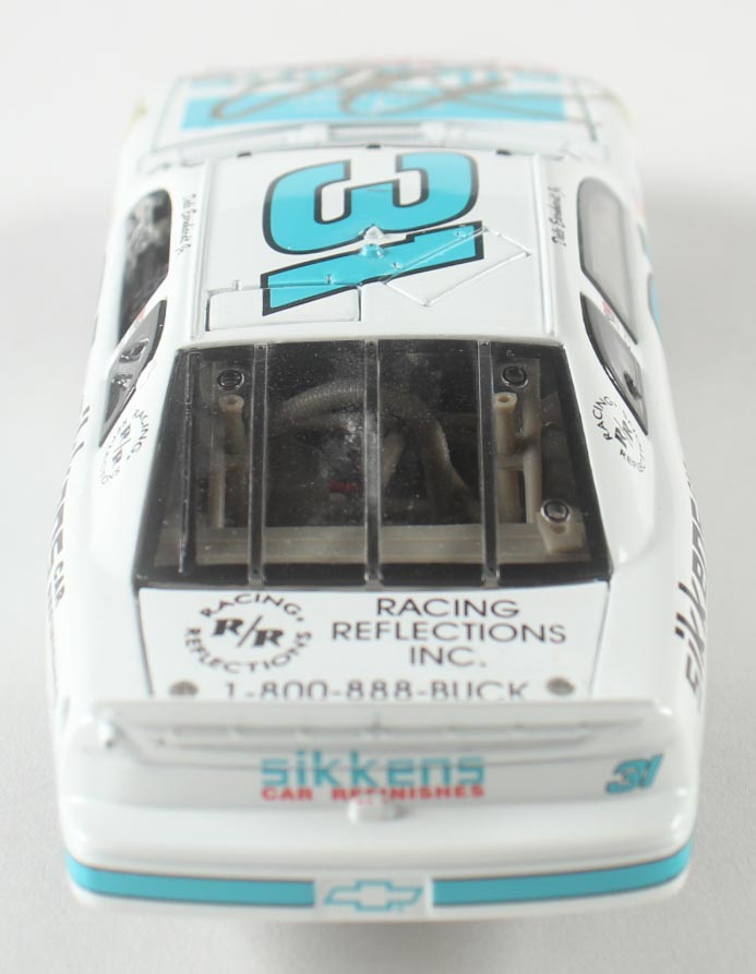 Dale Earnhardt Jr. Signed NASCAR #31 Sikkens White 1997 Monte Carlo - 1:24 Premium Action Diecast Car (Dale Jr.) at PristineAuction.com Dale Earnhardt Jr. Signed NASCAR #31 Sikkens White 1997 Monte Carlo - 1:24 Premium Action Diecast Car (Dale Jr.) at PristineAuction.com