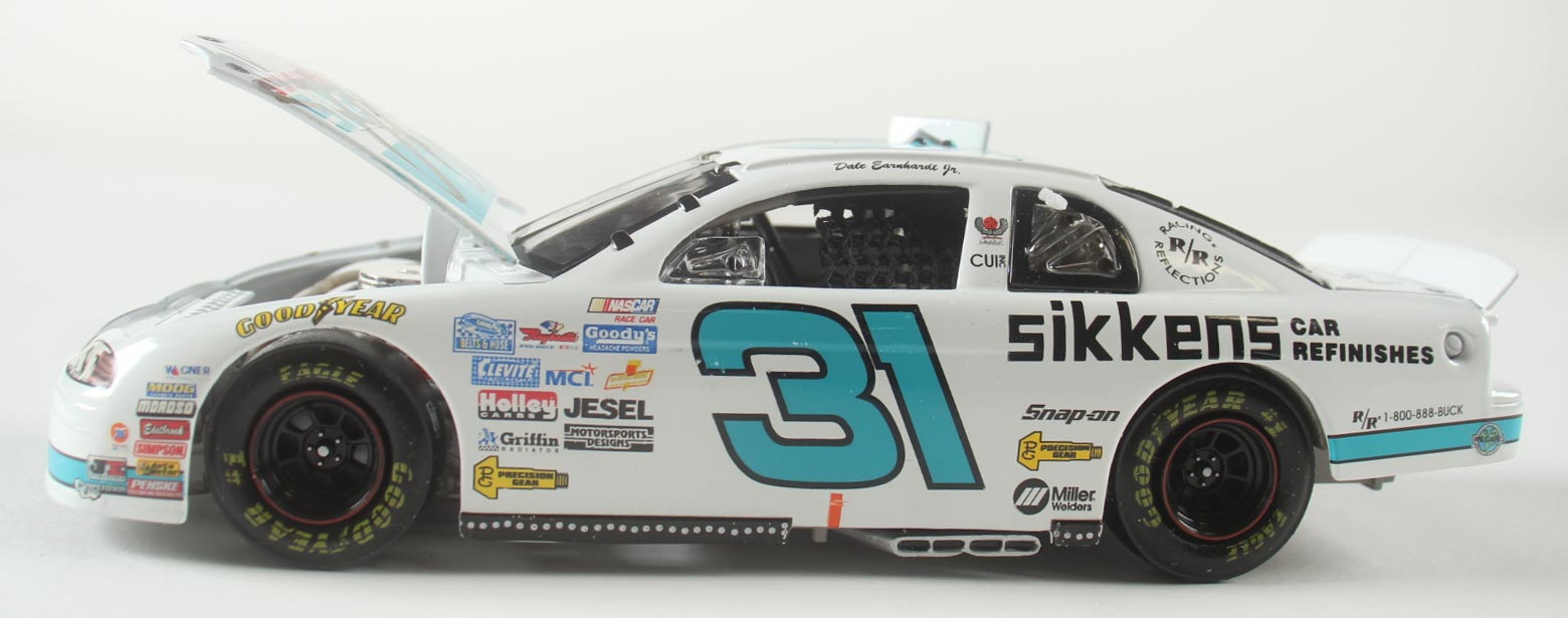 Dale Earnhardt Jr. Signed NASCAR #31 Sikkens White 1997 Monte Carlo - 1:24 Premium Action Diecast Car (Dale Jr.) at PristineAuction.com Dale Earnhardt Jr. Signed NASCAR #31 Sikkens White 1997 Monte Carlo - 1:24 Premium Action Diecast Car (Dale Jr.) at PristineAuction.com