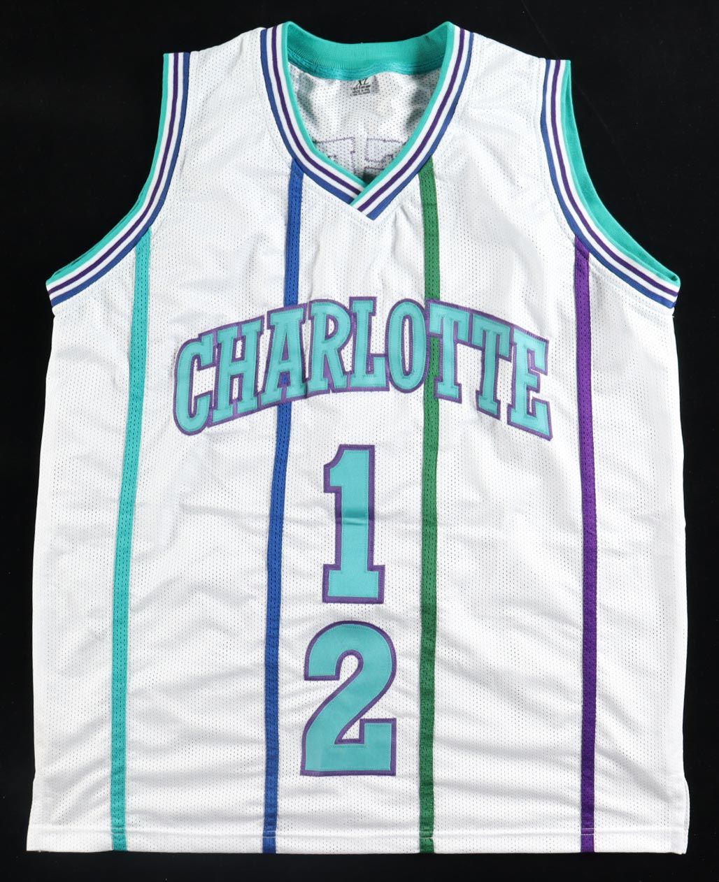 Muggsy Bogues & Larry Johnson Signed Jersey (JSA) at PristineAuction.com Muggsy Bogues & Larry Johnson Signed Jersey (JSA) at PristineAuction.com