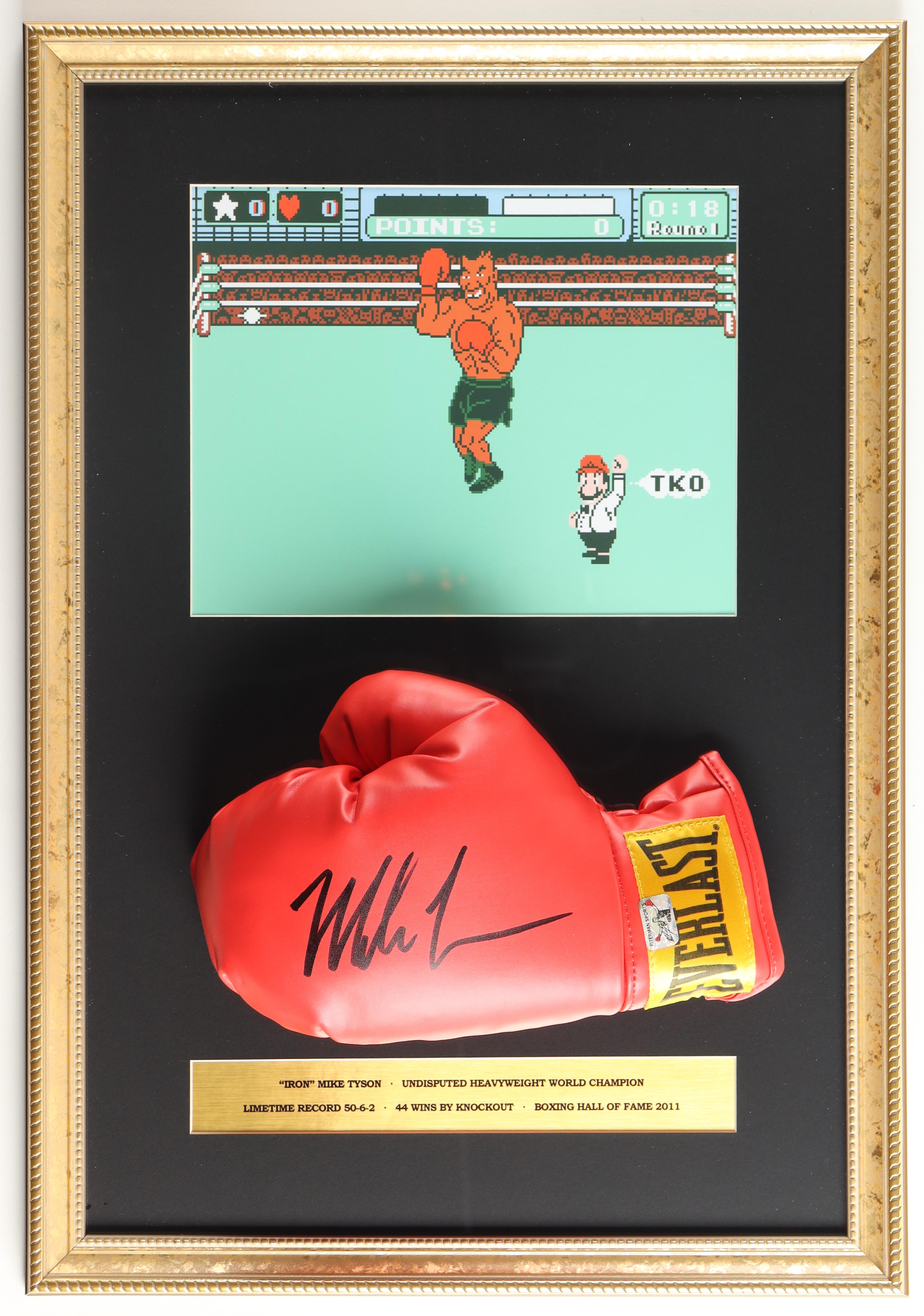 Mike Tyson Signed Custom Framed Everlast Boxing Glove Display with "Mike Tyson's Punch Out!!" Photo (Tyson) at PristineAuction.com Mike Tyson Signed Custom Framed Everlast Boxing Glove Display with "Mike Tyson's Punch Out!!" Photo (Tyson) at PristineAuction.com