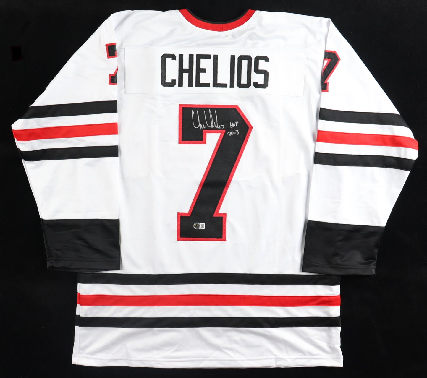 Chris Chelios Signed Jersey Inscribed "HOF 2013" (Beckett) at PristineAuction.com Chris Chelios Signed Jersey Inscribed "HOF 2013" (Beckett) at PristineAuction.com