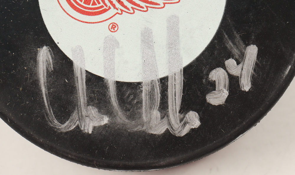 Chris Chelios Signed Red Wings Logo Hockey Puck (All World Memorabilia) at PristineAuction.com Chris Chelios Signed Red Wings Logo Hockey Puck (All World Memorabilia) at PristineAuction.com