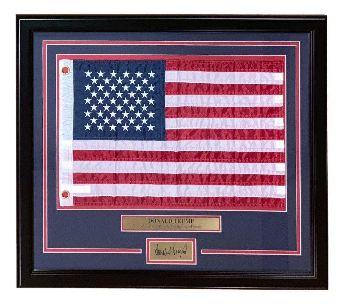 President Donald Trump Custom Framed American Flag Display with Laser Engraved Signature at PristineAuction.com President Donald Trump Custom Framed American Flag Display with Laser Engraved Signature at PristineAuction.com