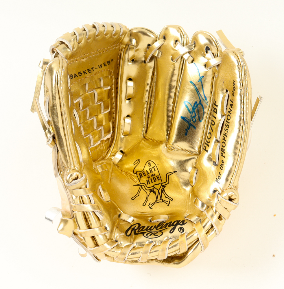 Fernando Tatis Jr. Signed Mini Gold Baseball Glove (Beckett) at PristineAuction.com Fernando Tatis Jr. Signed Mini Gold Baseball Glove (Beckett) at PristineAuction.com