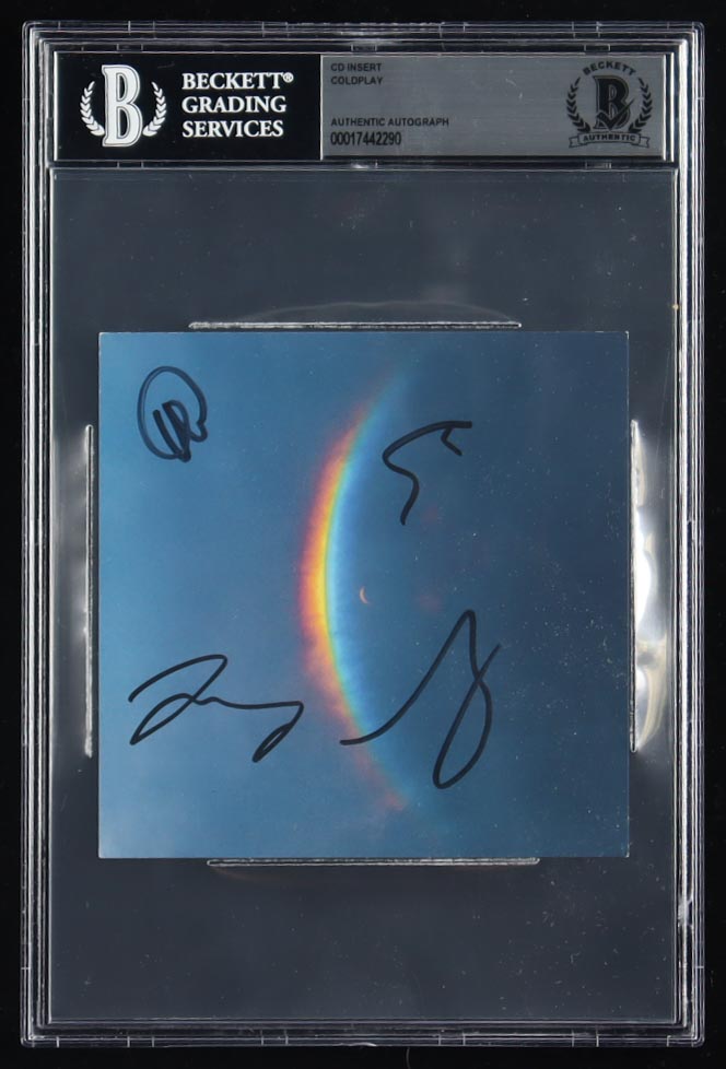 Coldplay "Moon Music" CD Insert Band-Signed By (4) With Chris Martin, Guy Berryman, Jonny Buckland & Will Champion (BGS) at PristineAuction.com Coldplay "Moon Music" CD Insert Band-Signed By (4) With Chris Martin, Guy Berryman, Jonny Buckland & Will Champion (BGS) at PristineAuction.com