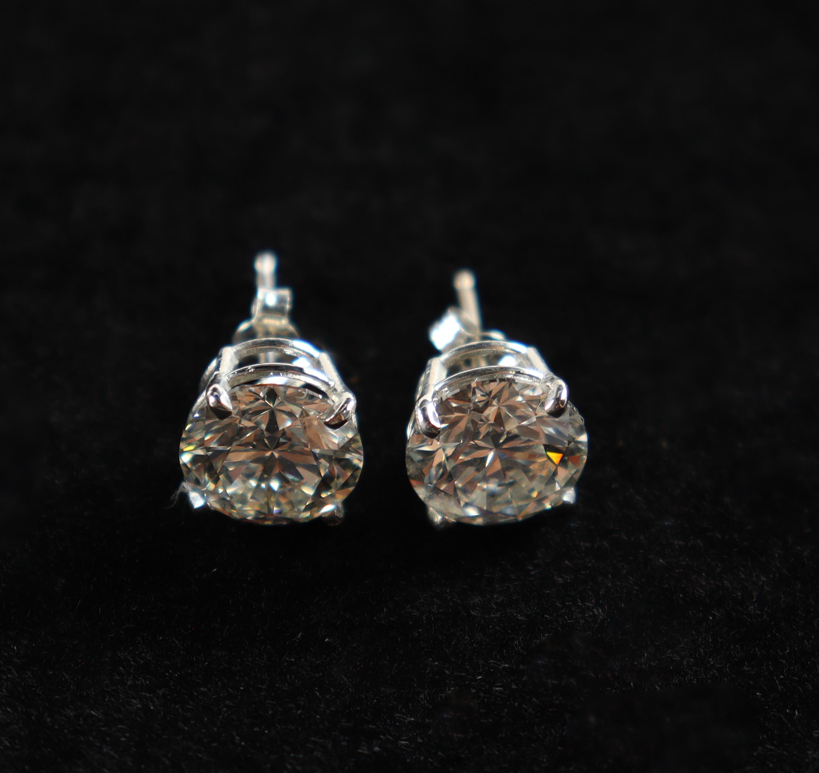 (2) 2.08 CTW | 4.16 Total CTW Pair of Laboratory Grown Round Brilliant Diamond Stud Earrings H, VVS2 | Estimated Value $8,000 (UGL & IGI) at PristineAuction.com (2) 2.08 CTW | 4.16 Total CTW Pair of Laboratory Grown Round Brilliant Diamond Stud Earrings H, VVS2 | Estimated Value $8,000 (UGL & IGI) at PristineAuction.com