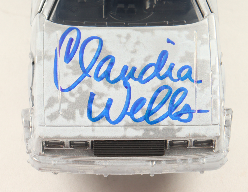 Claudia Wells Signed "Back to the Future" DeLorean Time Machine 1:32 Scale Die-Cast Car (Beckett) at PristineAuction.com Claudia Wells Signed "Back to the Future" DeLorean Time Machine 1:32 Scale Die-Cast Car (Beckett) at PristineAuction.com