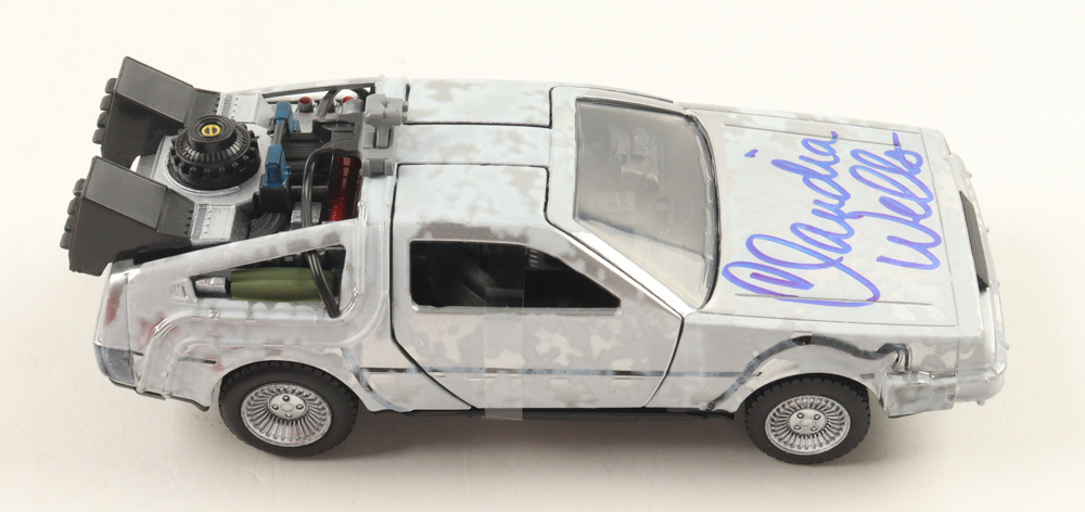 Claudia Wells Signed "Back to the Future" DeLorean Time Machine 1:32 Scale Die-Cast Car (Beckett) at PristineAuction.com Claudia Wells Signed "Back to the Future" DeLorean Time Machine 1:32 Scale Die-Cast Car (Beckett) at PristineAuction.com