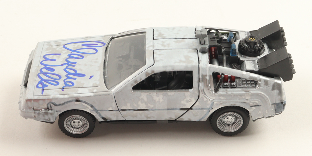Claudia Wells Signed "Back to the Future" DeLorean Time Machine 1:32 Scale Die-Cast Car (Beckett) at PristineAuction.com Claudia Wells Signed "Back to the Future" DeLorean Time Machine 1:32 Scale Die-Cast Car (Beckett) at PristineAuction.com