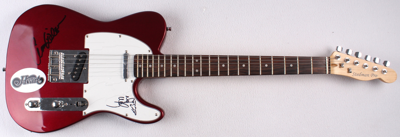 Ann Wilson & Nancy Wilson Signed "Heart" Electric Guitar (PA LOA) at PristineAuction.com Ann Wilson & Nancy Wilson Signed "Heart" Electric Guitar (PA LOA) at PristineAuction.com