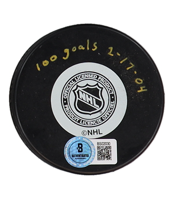 Martin St. Louis Signed Lightning Logo Hockey Puck Inscribed "100 Goals 2-17-04" (Beckett) at PristineAuction.com Martin St. Louis Signed Lightning Logo Hockey Puck Inscribed "100 Goals 2-17-04" (Beckett) at PristineAuction.com
