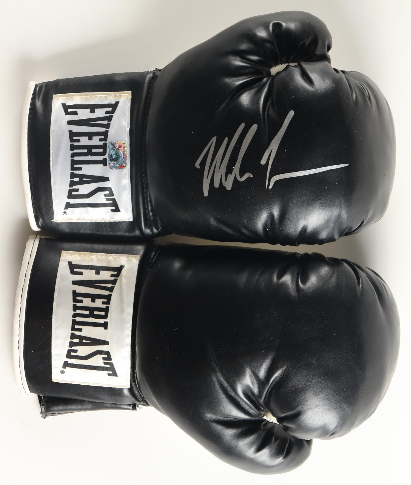 Mike Tyson Signed Everlast Boxing Gloves With Display Case (Tyson) at PristineAuction.com Mike Tyson Signed Everlast Boxing Gloves With Display Case (Tyson) at PristineAuction.com