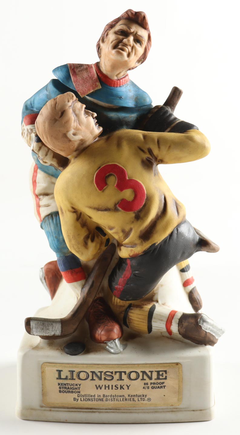 Vintage 1974 Lionstone Whisky Ceramic Hockey Figure Decanter at PristineAuction.com Vintage 1974 Lionstone Whisky Ceramic Hockey Figure Decanter at PristineAuction.com