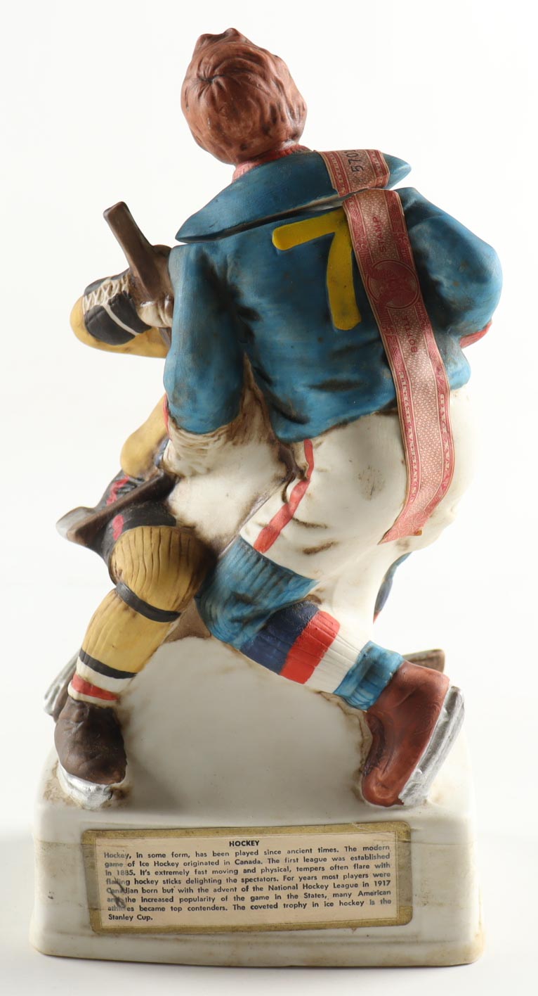 Vintage 1974 Lionstone Whisky Ceramic Hockey Figure Decanter at PristineAuction.com Vintage 1974 Lionstone Whisky Ceramic Hockey Figure Decanter at PristineAuction.com