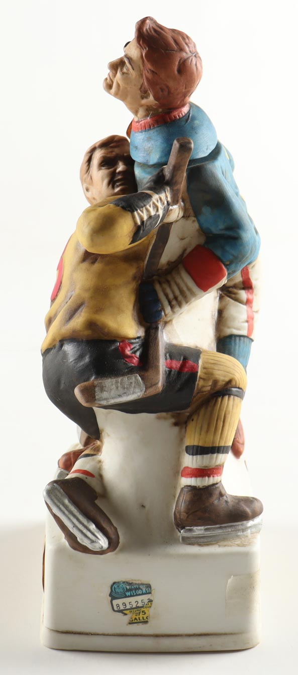 Vintage 1974 Lionstone Whisky Ceramic Hockey Figure Decanter at PristineAuction.com Vintage 1974 Lionstone Whisky Ceramic Hockey Figure Decanter at PristineAuction.com