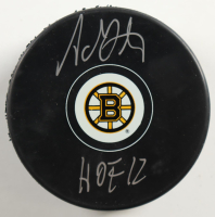 Adam Oates Signed Bruins Logo Hockey Puck Inscribed "HOF 12" (Beckett) at PristineAuction.com