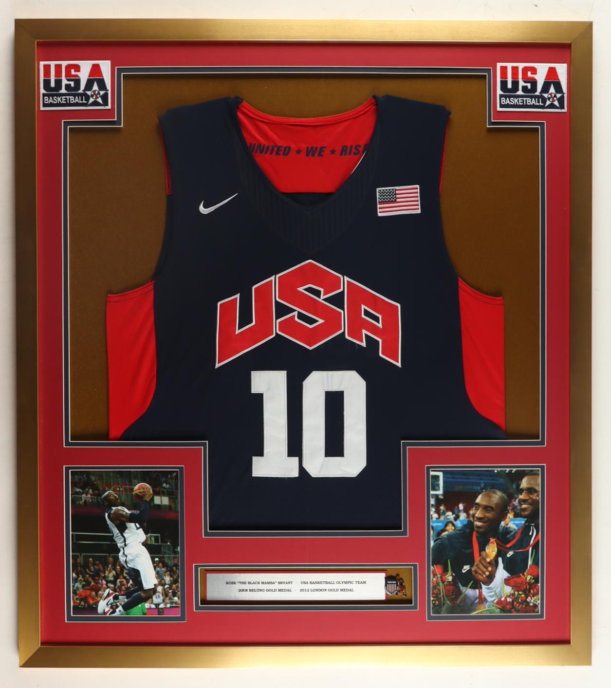 Kobe Bryant Team USA Custom Framed Nike Jersey Display With (1) Team USA Olympic Basketball Pin & (2) Cloth Team USA Logo Patches at PristineAuction.com Kobe Bryant Team USA Custom Framed Nike Jersey Display With (1) Team USA Olympic Basketball Pin & (2) Cloth Team USA Logo Patches at PristineAuction.com