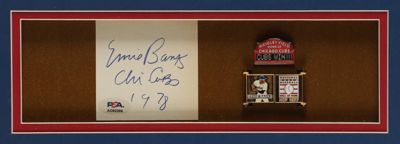 Ernie Banks Signed Cubs Custom Framed Cut Display Inscribed "Chi-Cubs 1978" With Jersey, Hall Of Fame Bronze Plaque & (2) Cloth Team Logo Patches (PSA) at PristineAuction.com Ernie Banks Signed Cubs Custom Framed Cut Display Inscribed "Chi-Cubs 1978" With Jersey, Hall Of Fame Bronze Plaque & (2) Cloth Team Logo Patches (PSA) at PristineAuction.com