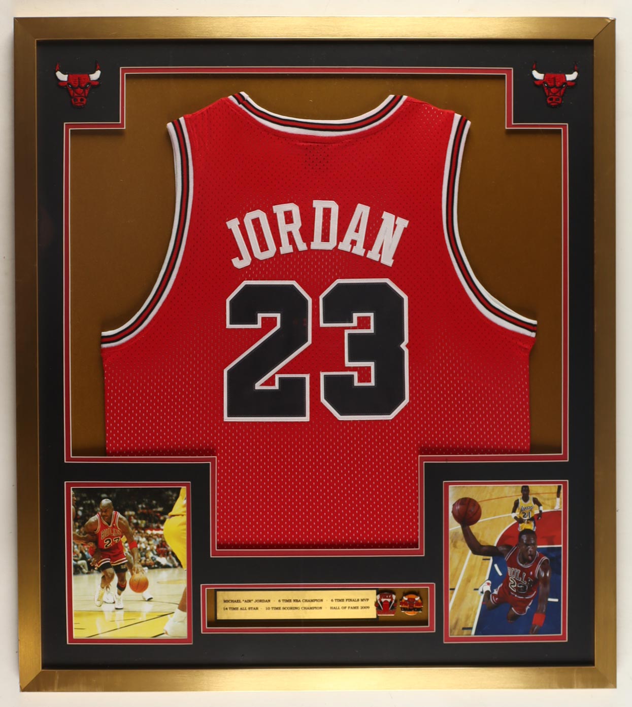 Michael Jordan Custom Framed Jersey Display with Bulls Eastern Conference & 1996 NBA Champions Pin & (2) Team Logo Patches at PristineAuction.com Michael Jordan Custom Framed Jersey Display with Bulls Eastern Conference & 1996 NBA Champions Pin & (2) Team Logo Patches at PristineAuction.com