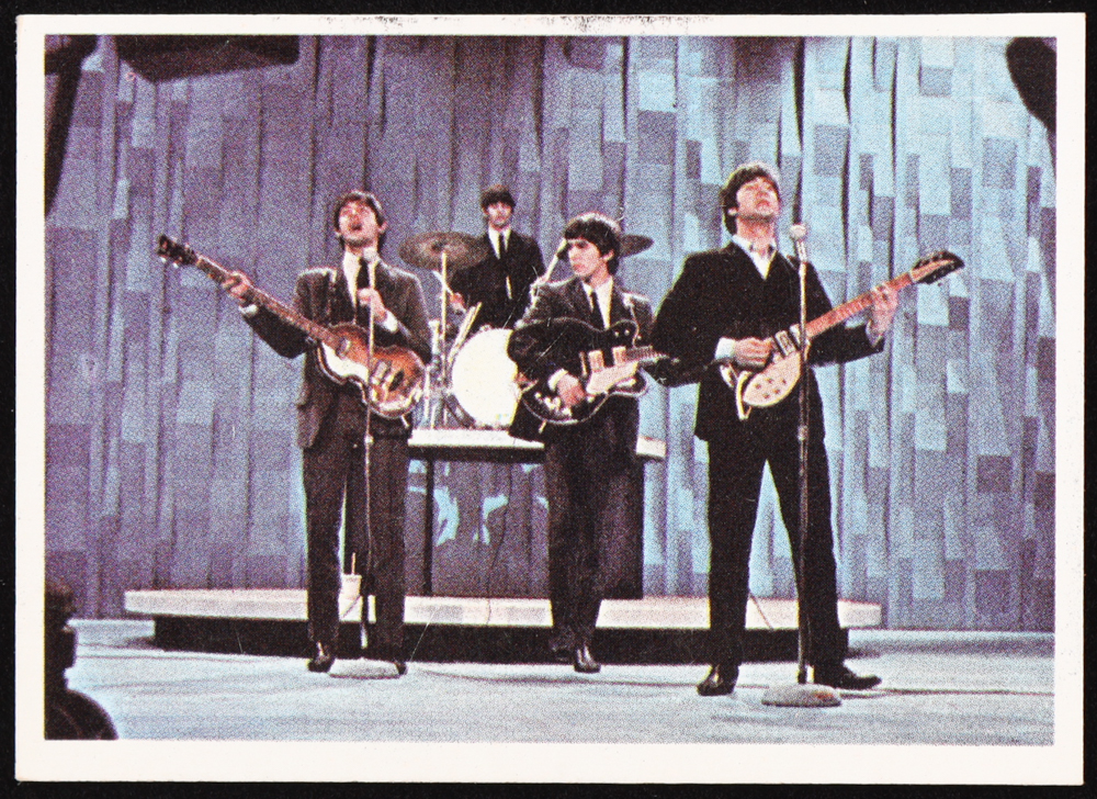 1964 Topps The Beatles Color #17 Ringo, George, John and Paul - Paul Speaking at PristineAuction.com 1964 Topps The Beatles Color #17 Ringo, George, John and Paul - Paul Speaking at PristineAuction.com