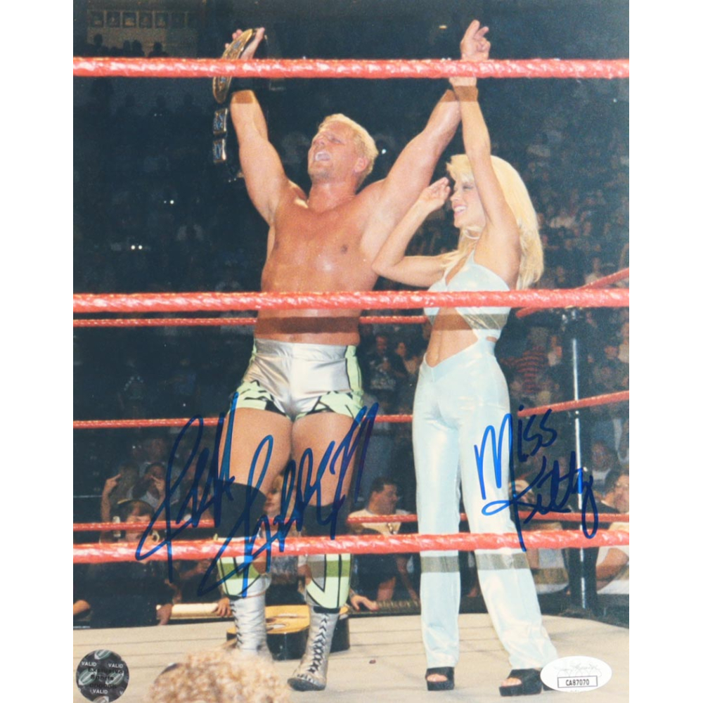 Jeff Jarrett & Miss Kitty Signed WWF 8x10 Photo (JSA) Pristine Auction