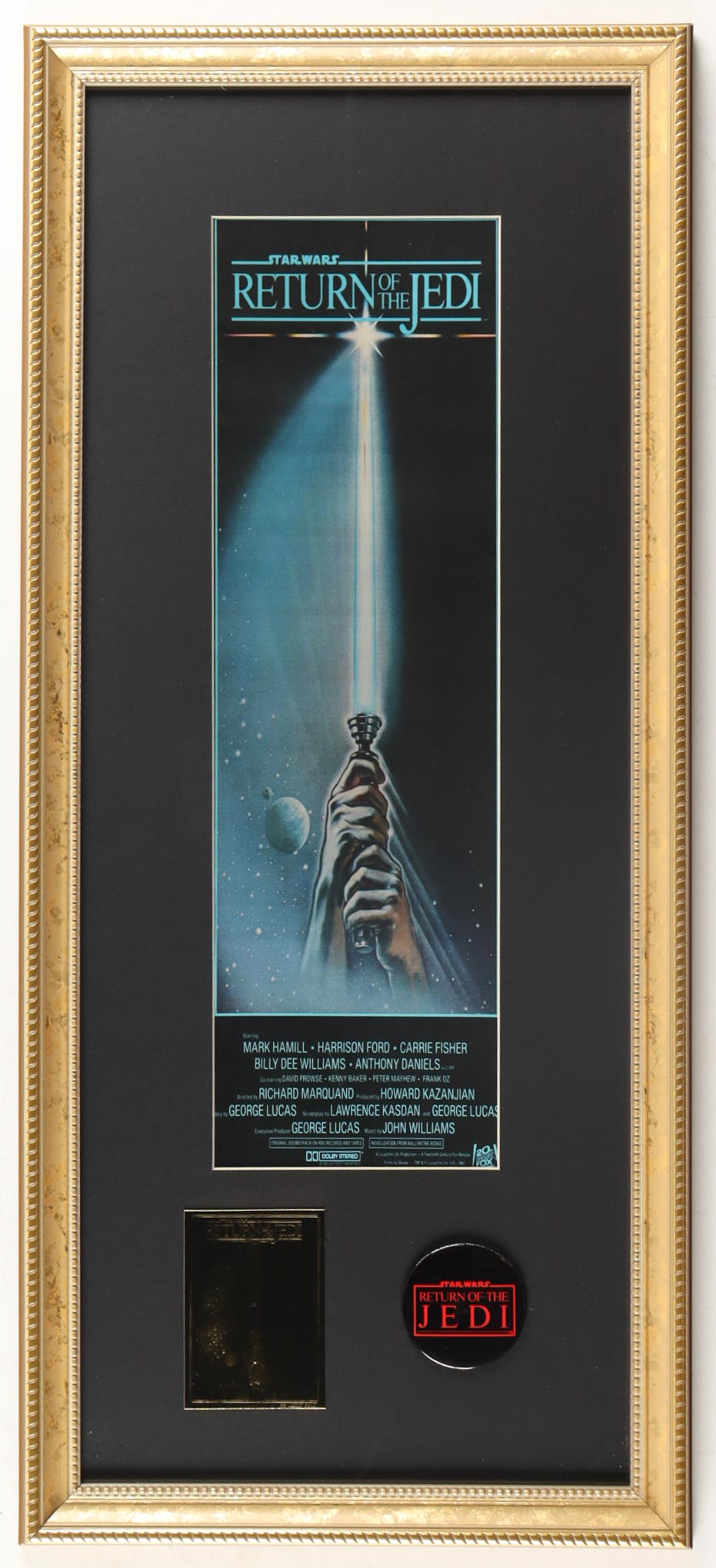 "Star Wars: Return of the Jedi" Custom Framed Print Display with Official 23KT Gold Trading Card & Return of the Jedi Lapel Pin at PristineAuction.com "Star Wars: Return of the Jedi" Custom Framed Print Display with Official 23KT Gold Trading Card & Return of the Jedi Lapel Pin at PristineAuction.com