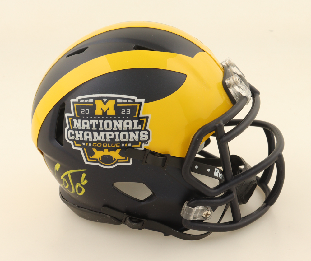 Cornelius Johnson Signed Michigan Wolverines 2023 National Champions Logo Speed Mini Helmet (JSA) at PristineAuction.com Cornelius Johnson Signed Michigan Wolverines 2023 National Champions Logo Speed Mini Helmet (JSA) at PristineAuction.com