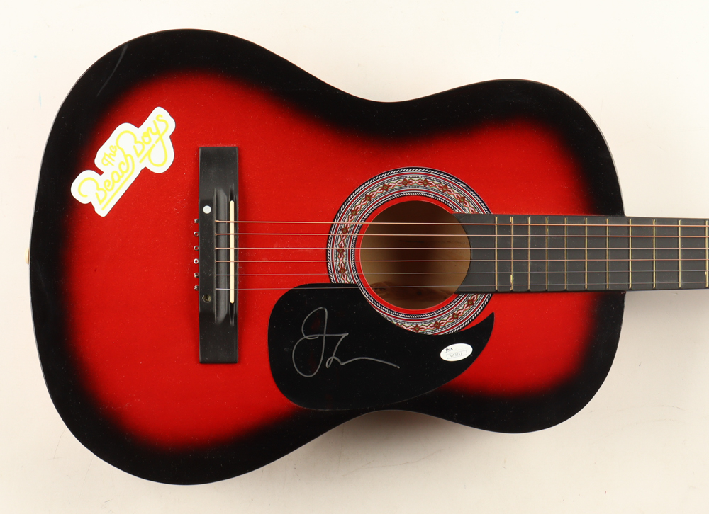 John Stamos Signed 38" Acoustic Guitar with Beach Boys Sticker & Display Stand (JSA) at PristineAuction.com John Stamos Signed 38" Acoustic Guitar with Beach Boys Sticker & Display Stand (JSA) at PristineAuction.com