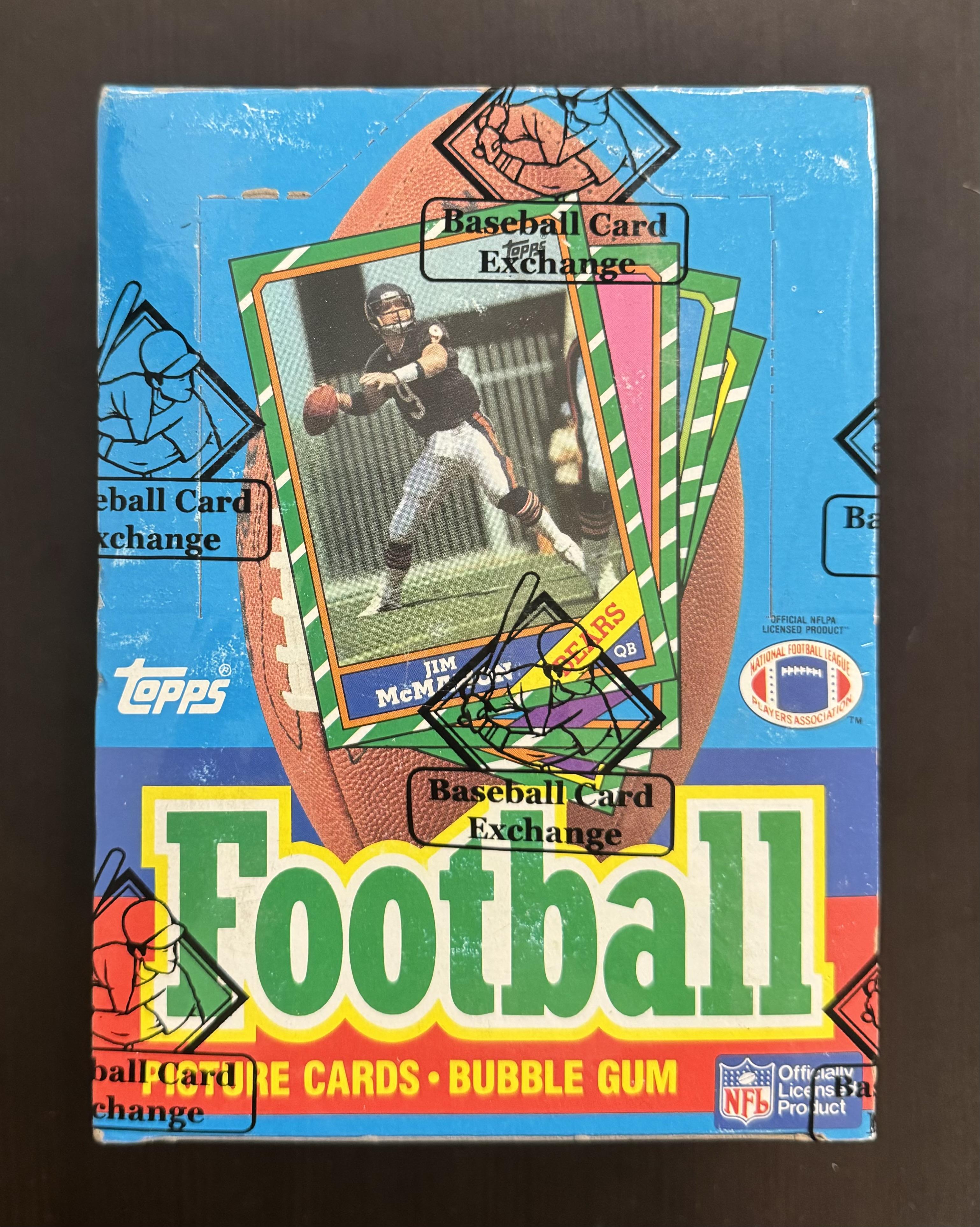 1986 Topps Football Wax Box with (36) Packs (BBCE) at PristineAuction.com 1986 Topps Football Wax Box with (36) Packs (BBCE) at PristineAuction.com