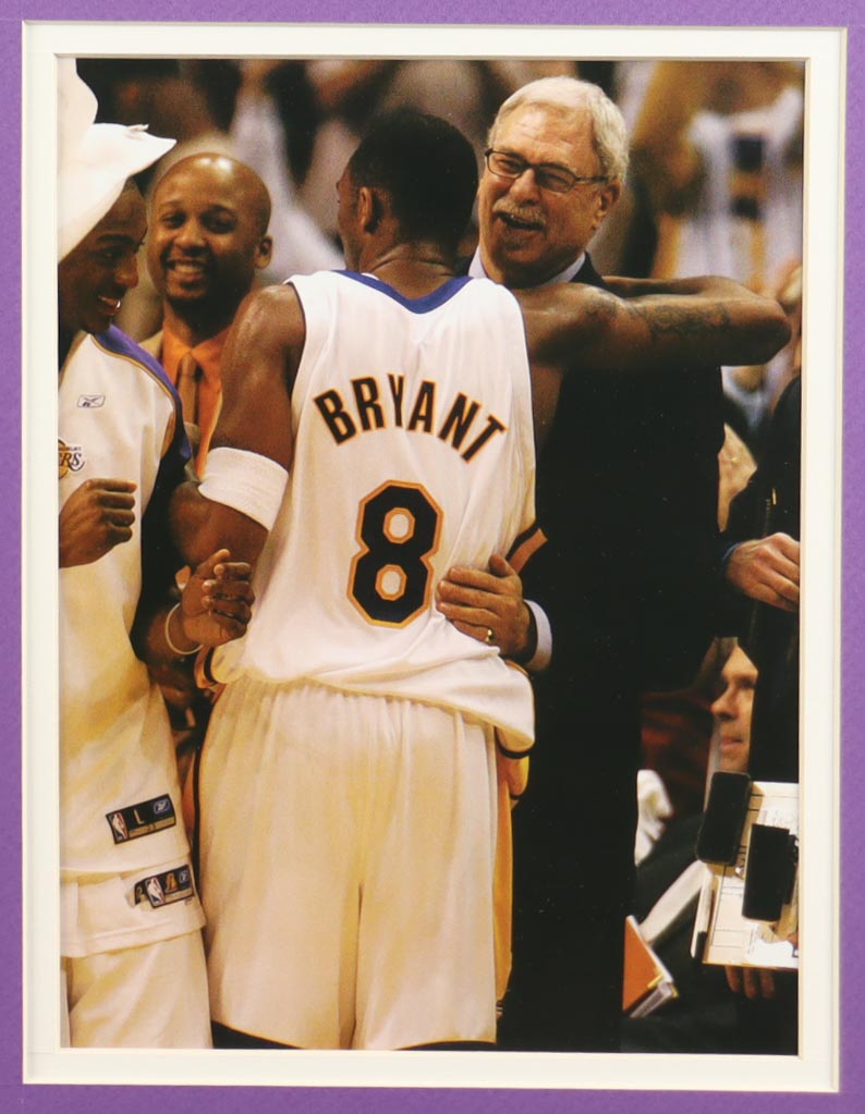 Kobe Bryant Lakers Custom Framed Jersey Display With LE 2000, 2002 & 2010 Championship Pins, (2) Cloth Team Logo Patches & (2) Photos at PristineAuction.com Kobe Bryant Lakers Custom Framed Jersey Display With LE 2000, 2002 & 2010 Championship Pins, (2) Cloth Team Logo Patches & (2) Photos at PristineAuction.com