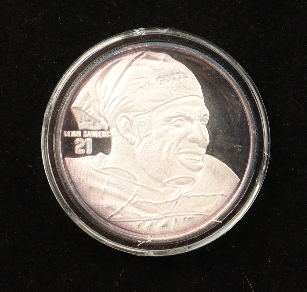 Deion Sanders LE The Highland Mint 1 Troy Oz .999 Fine Silver Commemorative Bullion Round at PristineAuction.com Deion Sanders LE The Highland Mint 1 Troy Oz .999 Fine Silver Commemorative Bullion Round at PristineAuction.com