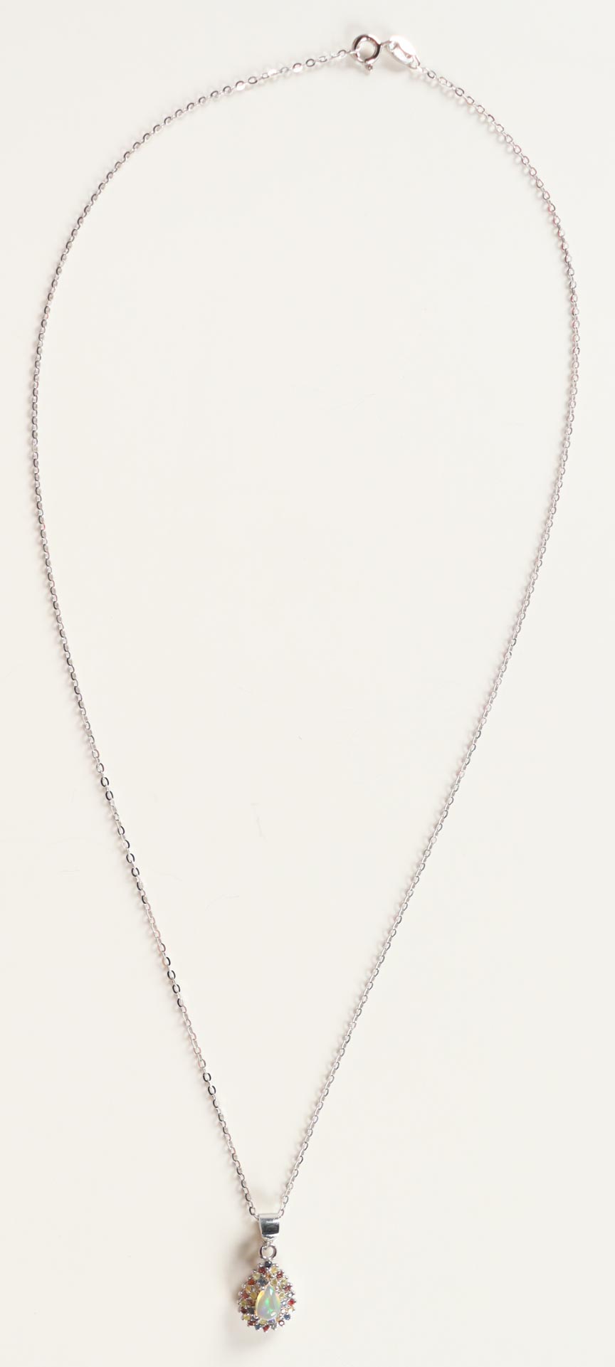 New 1 Carat Lab Grown Opal & Sapphire Necklace | Estimated Retail Value: $950.00 (UGL) at PristineAuction.com New 1 Carat Lab Grown Opal & Sapphire Necklace | Estimated Retail Value: $950.00 (UGL) at PristineAuction.com