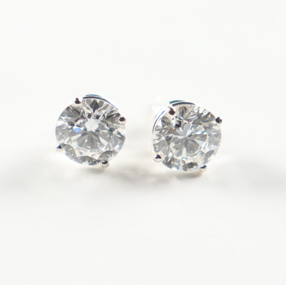 New 4.04 Carats Lab Grown Pair Of Round Brilliant Diamond Stud Earrings | Estimated Retail Value: $6,400.00 (UGL & IGI) at PristineAuction.com New 4.04 Carats Lab Grown Pair Of Round Brilliant Diamond Stud Earrings | Estimated Retail Value: $6,400.00 (UGL & IGI) at PristineAuction.com