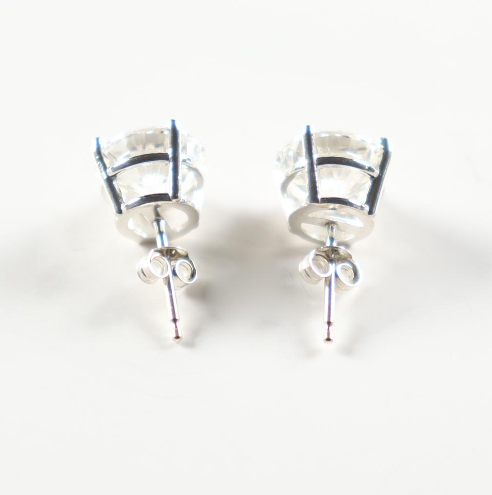 New 4.04 Carats Lab Grown Pair Of Round Brilliant Diamond Stud Earrings | Estimated Retail Value: $6,400.00 (UGL & IGI) at PristineAuction.com New 4.04 Carats Lab Grown Pair Of Round Brilliant Diamond Stud Earrings | Estimated Retail Value: $6,400.00 (UGL & IGI) at PristineAuction.com