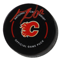 MacKenzie Weegar Signed Flames Logo Hockey Puck (Premium) at PristineAuction.com