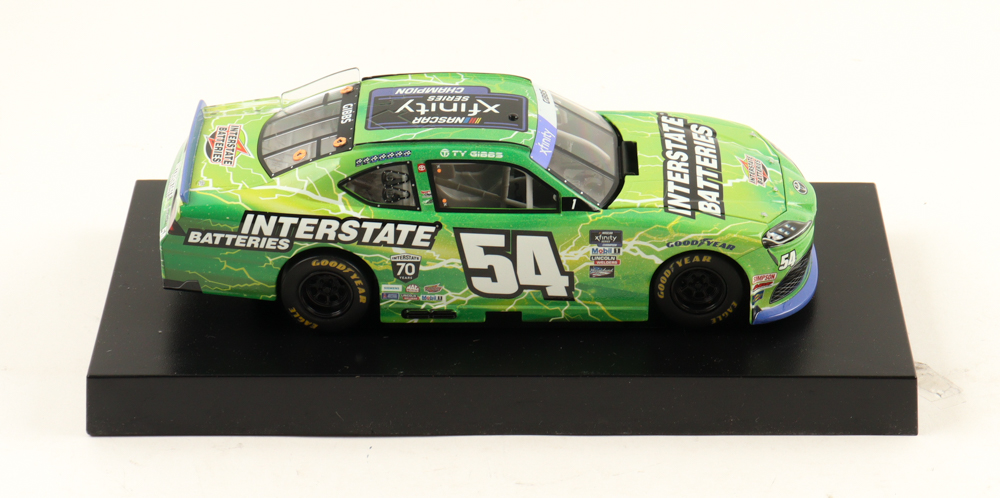 Ty Gibbs LE NASCAR #54 Interstate Batteries Xfinity Champion 2022 Supra 1:24 Scale Diecast Car at PristineAuction.com Ty Gibbs LE NASCAR #54 Interstate Batteries Xfinity Champion 2022 Supra 1:24 Scale Diecast Car at PristineAuction.com