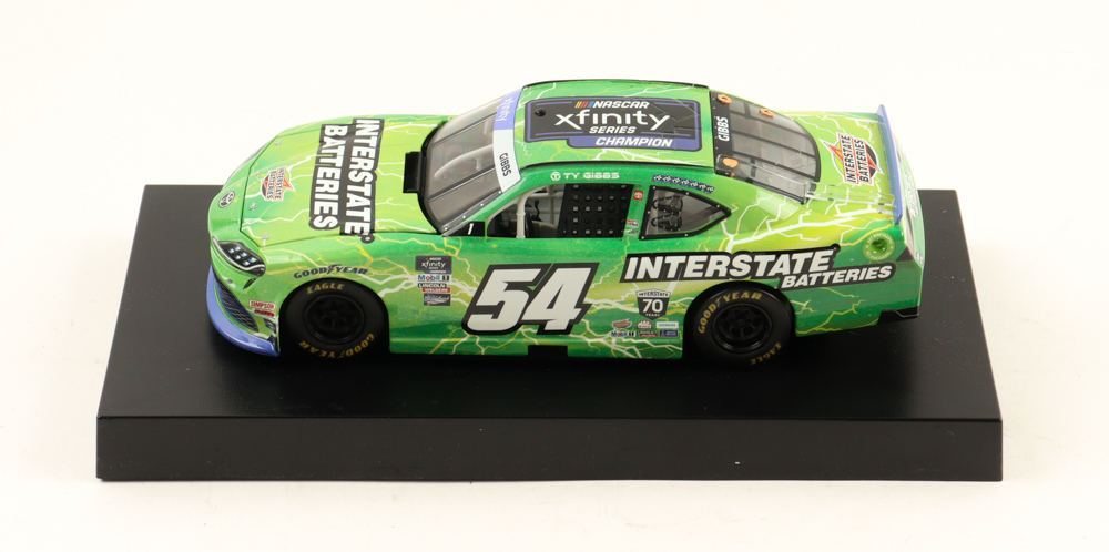 Ty Gibbs LE NASCAR #54 Interstate Batteries Xfinity Champion 2022 Supra 1:24 Scale Diecast Car at PristineAuction.com Ty Gibbs LE NASCAR #54 Interstate Batteries Xfinity Champion 2022 Supra 1:24 Scale Diecast Car at PristineAuction.com