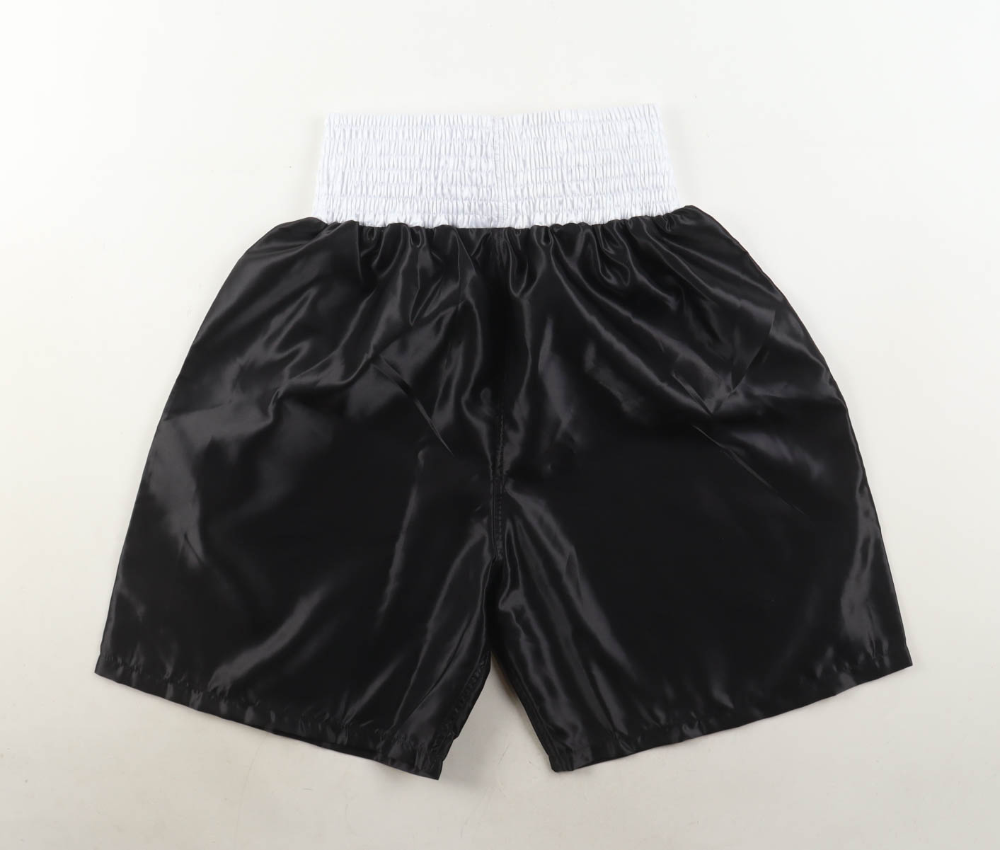 James "Buster" Douglas Signed Title Trim Boxing Trunks Inscribed "I Defeat Iron Mike 2-11-90" (Schwartz) at PristineAuction.com James "Buster" Douglas Signed Title Trim Boxing Trunks Inscribed "I Defeat Iron Mike 2-11-90" (Schwartz) at PristineAuction.com