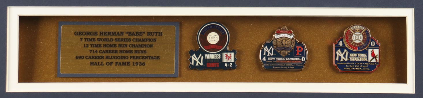 Babe Ruth Yankees Custom Framed Jersey Display with (2) Cloth Logo Patches & 1923, 27, 28 Yankees World Series Pins at PristineAuction.com Babe Ruth Yankees Custom Framed Jersey Display with (2) Cloth Logo Patches & 1923, 27, 28 Yankees World Series Pins at PristineAuction.com