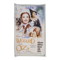 "The Wizard of Oz" 15x24 Movie Poster Photo Signed By (4) with Mickey Carroll, Jerry Maren, Karl Slover, Donna Stewart-Hardway With Character Inscriptions (JSA) at PristineAuction.com