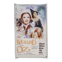 "The Wizard of Oz" 15x24 Movie Poster Photo Signed By (4) with Mickey Carroll, Jerry Maren, Karl Slover, Donna Stewart-Hardway With Character Inscriptions (JSA) at PristineAuction.com