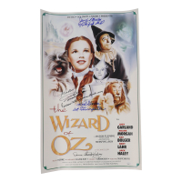 "The Wizard of Oz" 15x24 Movie Poster Photo Signed By (4) with Mickey Carroll, Jerry Maren, Karl Slover, Donna Stewart-Hardway With Character Inscriptions (JSA) at PristineAuction.com