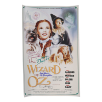 "The Wizard of Oz" 15x24 Movie Poster Photo Signed By (4) with Mickey Carroll, Jerry Maren, Karl Slover, Donna Stewart-Hardway With Character Inscriptions (JSA) at PristineAuction.com