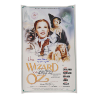 "The Wizard of Oz" 15x24 Movie Poster Photo Signed By (4) with Mickey Carroll, Jerry Maren, Karl Slover, Donna Stewart-Hardway With Character Inscriptions (JSA) at PristineAuction.com