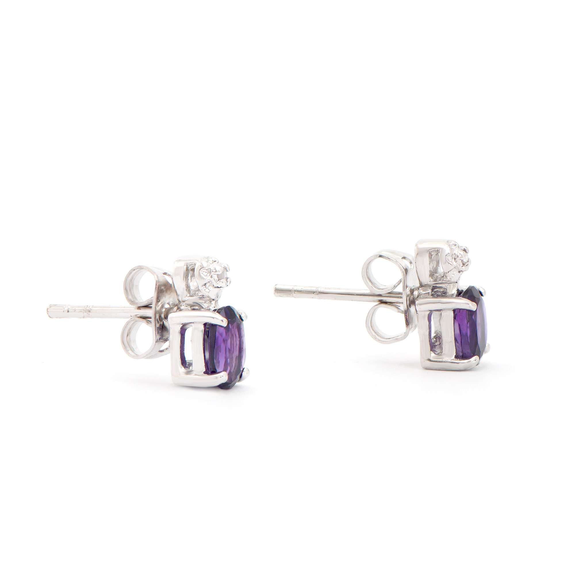 0.84 CTW Natural Amethyst & Diamonds Rhodium Plated Designer Earrings  H-I,  I3 | Estimated Retail Value: $1,269 (AMG) at PristineAuction.com 0.84 CTW Natural Amethyst & Diamonds Rhodium Plated Designer Earrings  H-I,  I3 | Estimated Retail Value: $1,269 (AMG) at PristineAuction.com